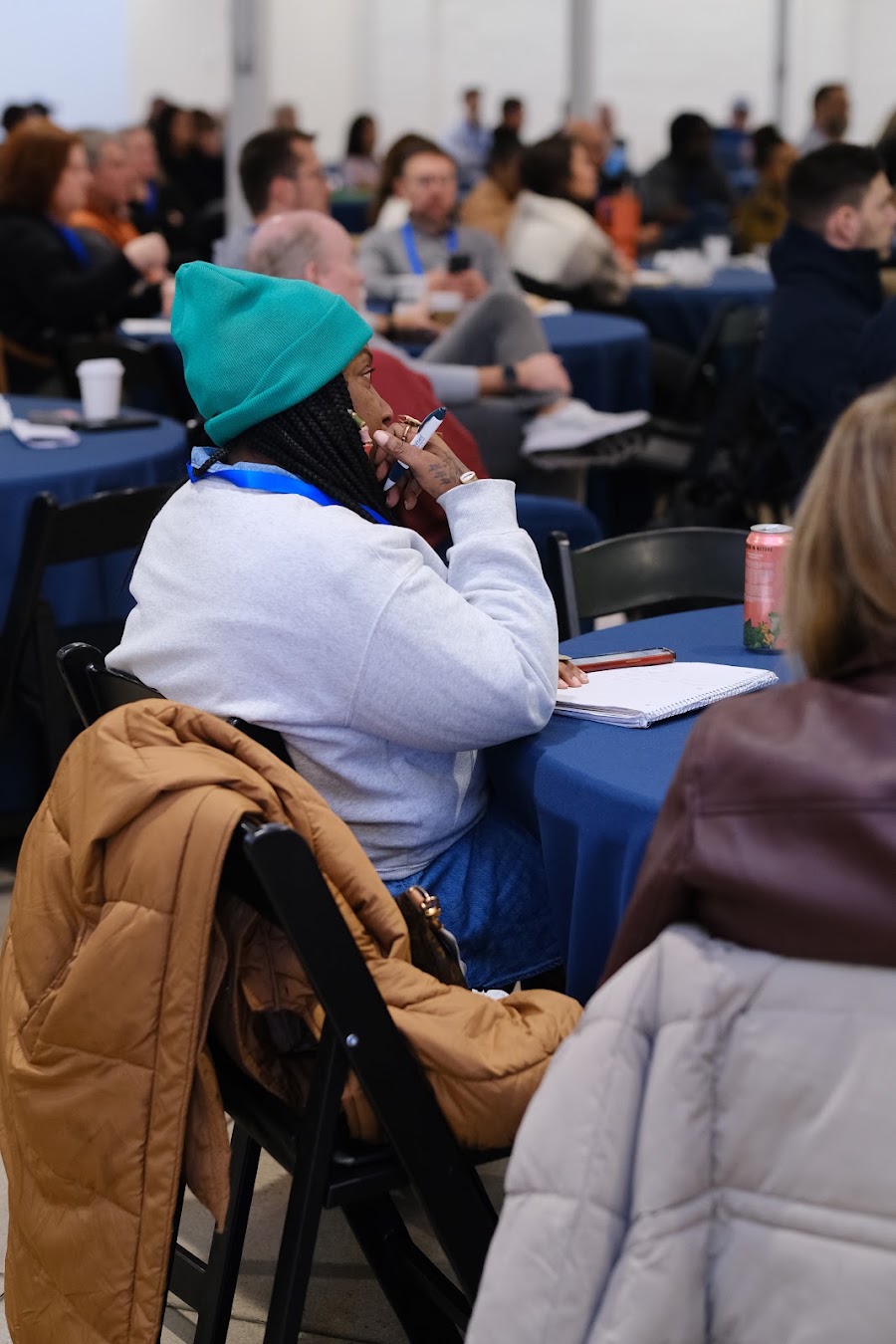 Attendee taking notes at Colorado RE•CON