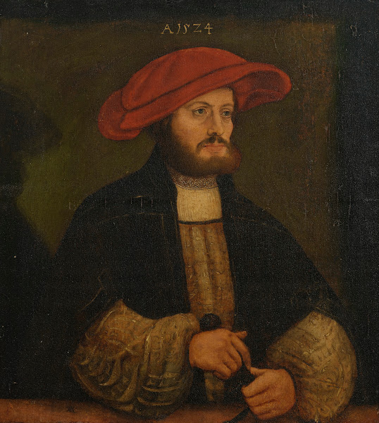 Portrait of a gentleman in a red cap before a ledge 1524