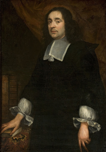 Portrait of a man at the table covered with a carpet