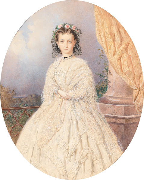 A Portrait Of A Bride With Roses In The Hair Standing On A Balcony
