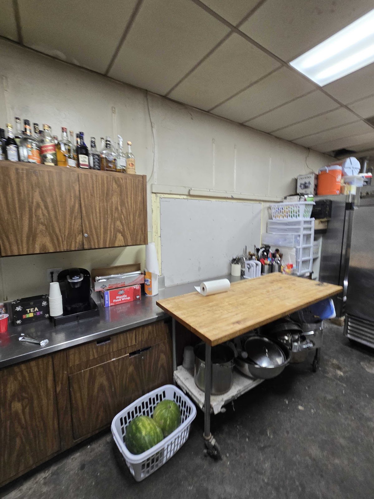 Kitchen storage and prep area — completed