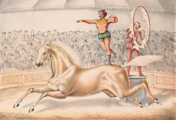Circus performer leaping through a ring of fire