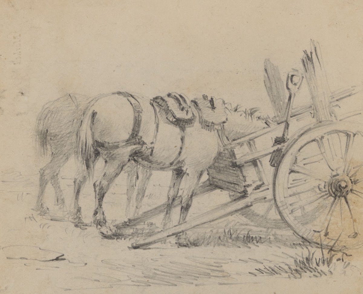 Horses eating from two wheeled cart
