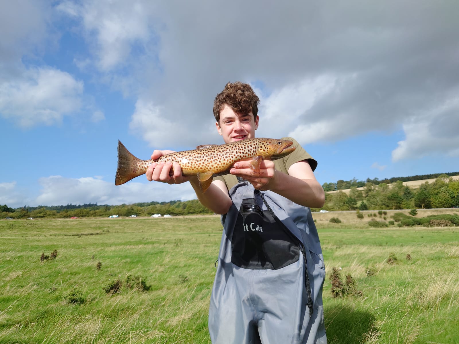 Blair Rodgers with a Brown Trout caught from the River Earn near Aberuthven