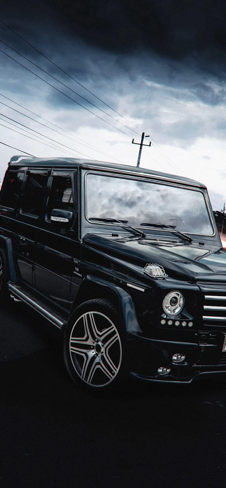 Mercedes G-Wagen Under Stormy Sky - Automotive Photography 2K iPhone Wallpaper (1463x3165)