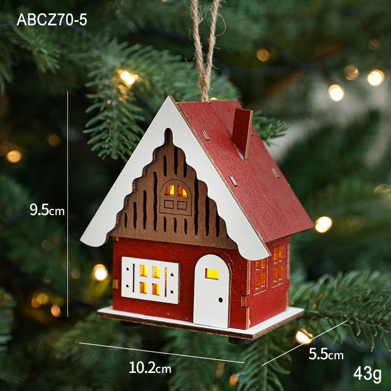 Illuminated wooden house for Christmas time