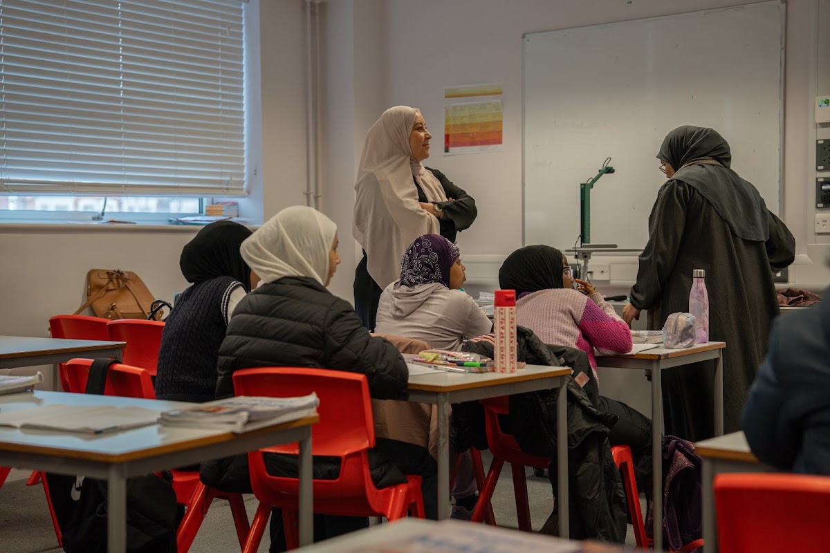 Girls class with their teacher