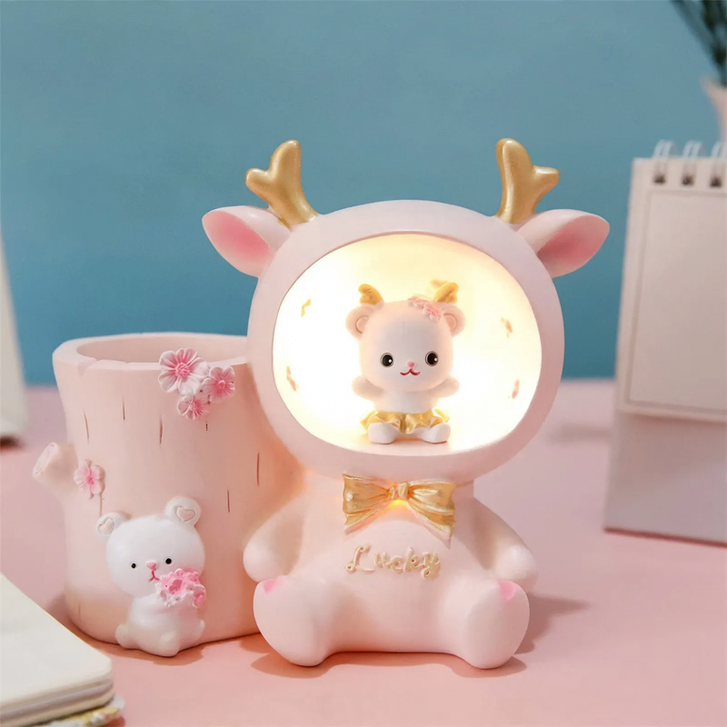 Decorative animal figure with pencil holder and light