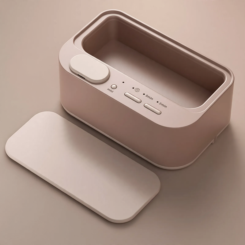 Ultrasonic cleaning device, portable, dual chamber