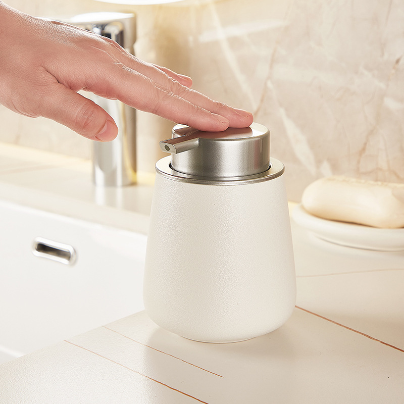 Ceramic soap dispenser with pump