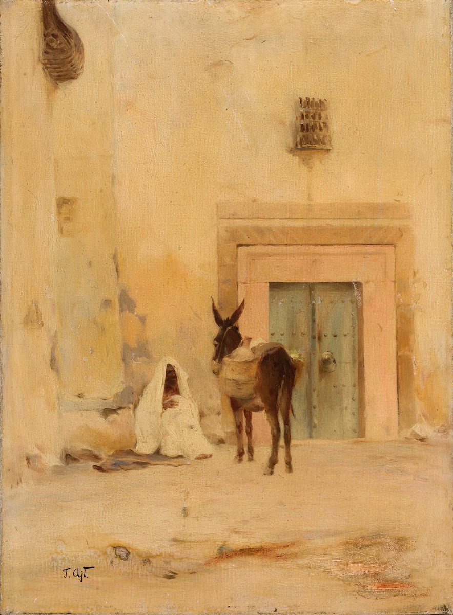 Arab and a donkey at the wall of a house