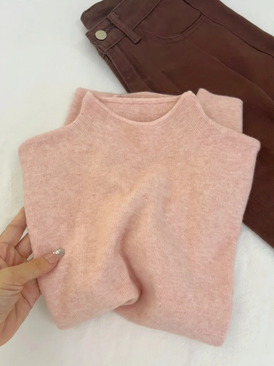 Women's knitted sweater with a stand collar, lined