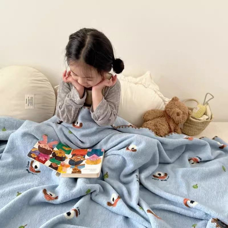 Cozy children's living blanket with cartoon motif, various sizes