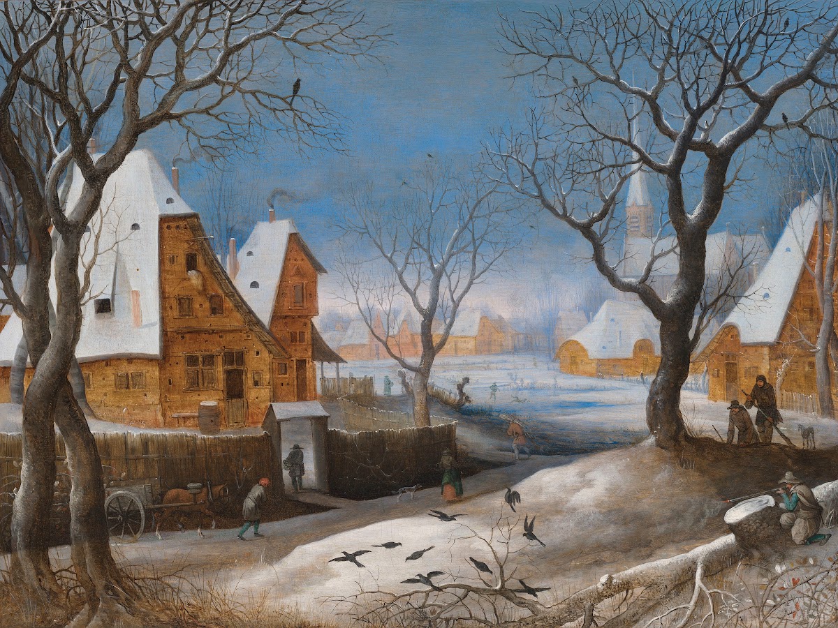 A winter landscape with figures in a village