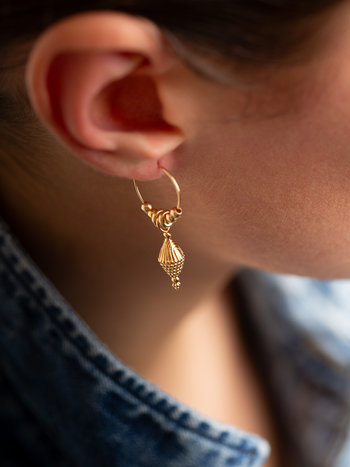 Моно серьга с подвесками волчок