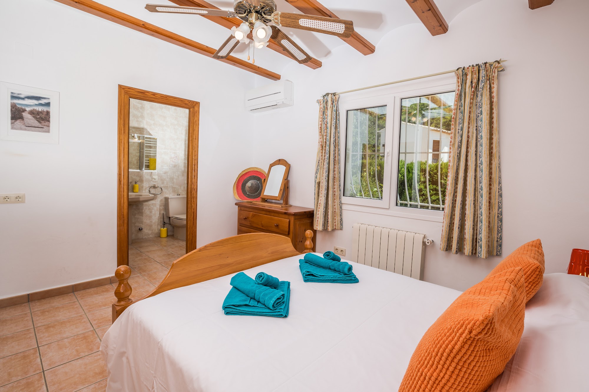 Double bedroom with traditional Spanish bedhead