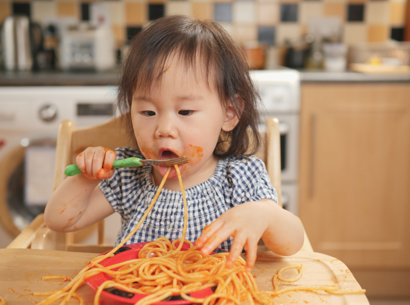 Feeding therapy session with a child