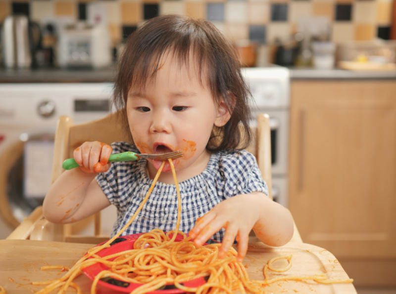 Feeding therapy session with a child