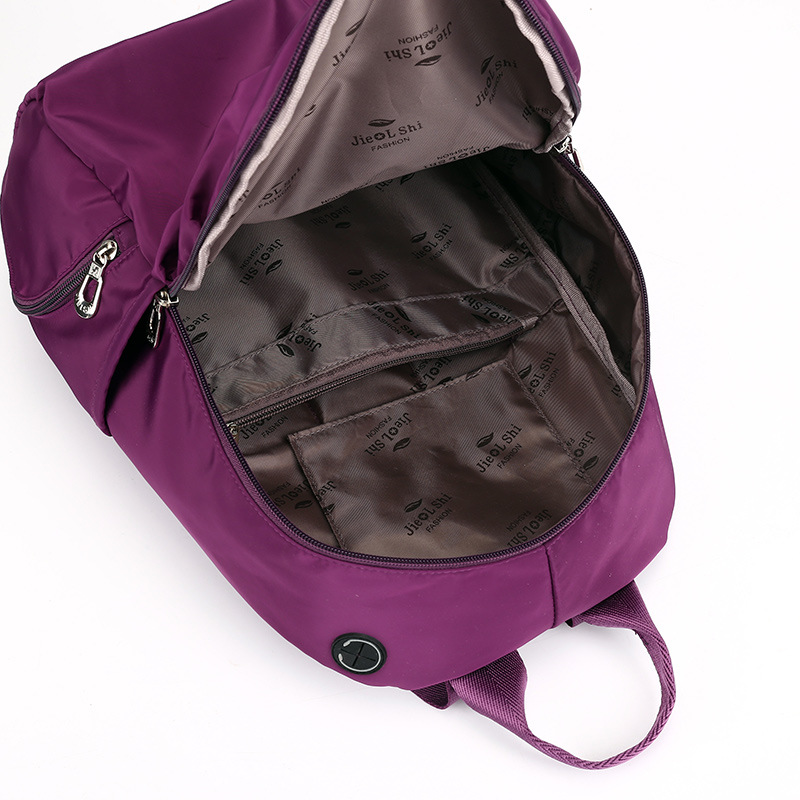 Backpack with drink compartment, nylon, back load distribution