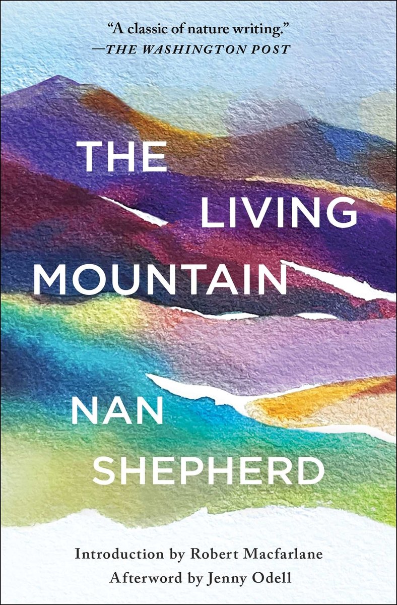 The flat front book cover for The Living Mountain
