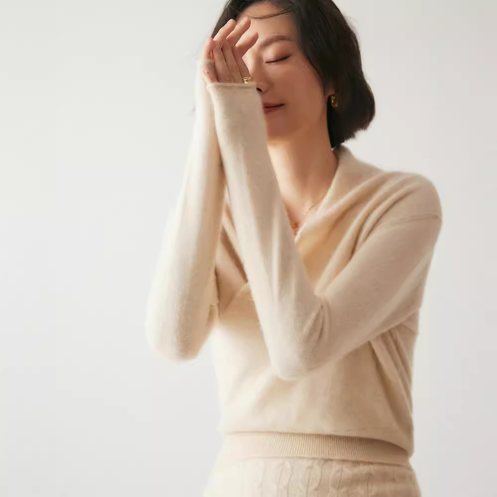 Women's knitted sweater with V-neck