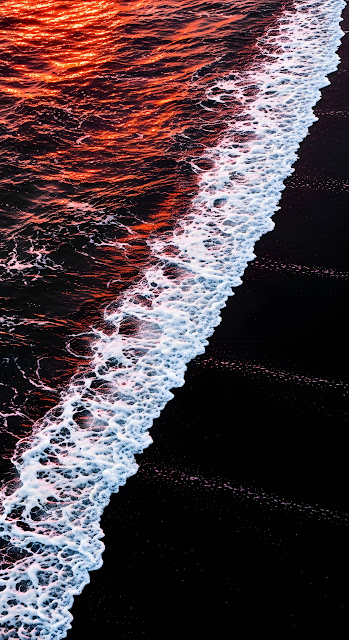 Dynamic High-Angle Abstract Illustration of Orange and Black Seawater with White Foam - Free mobile Wallpaper