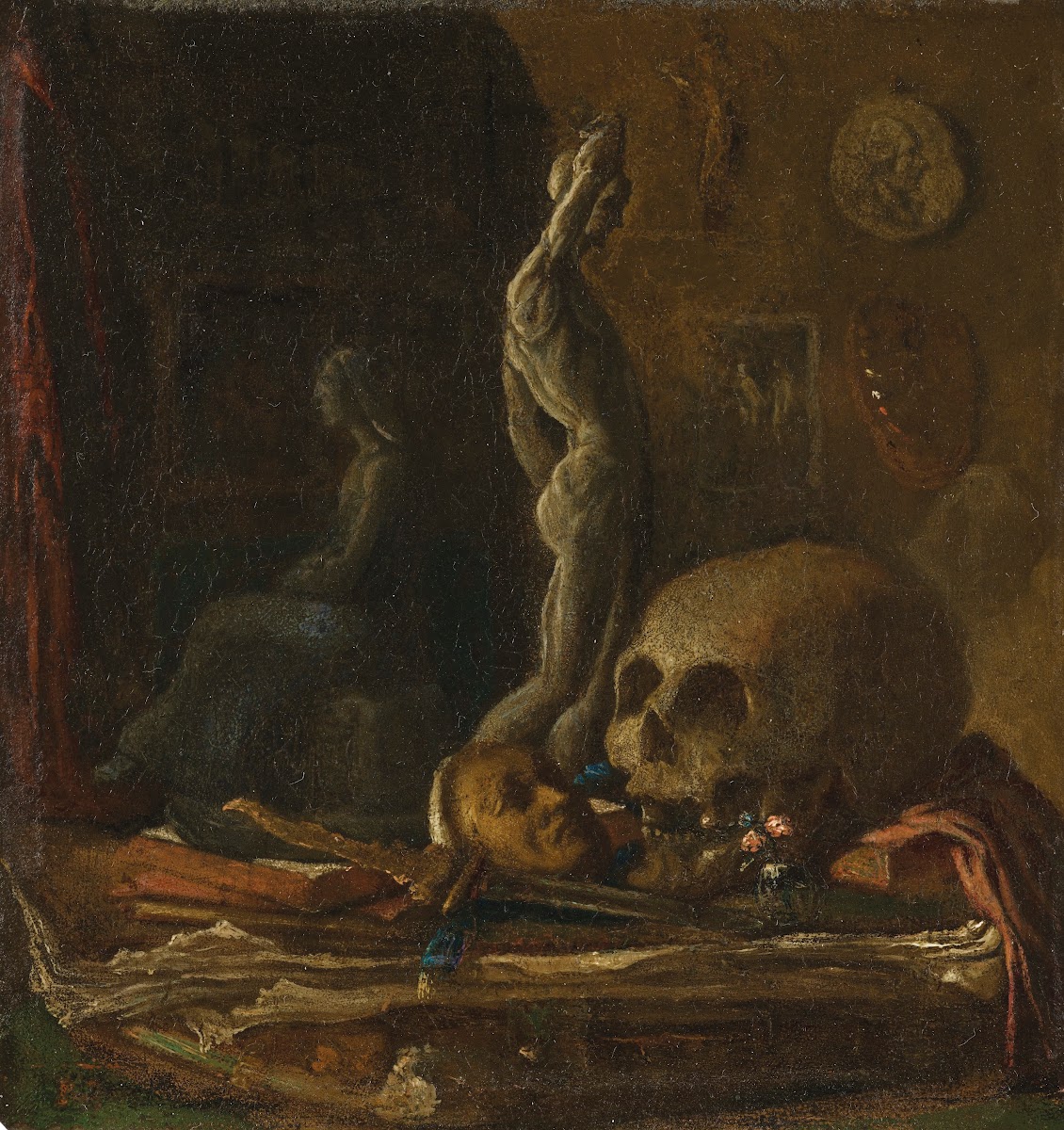 A skull mask sword statuette and book on a table in an artists studio oil on cop