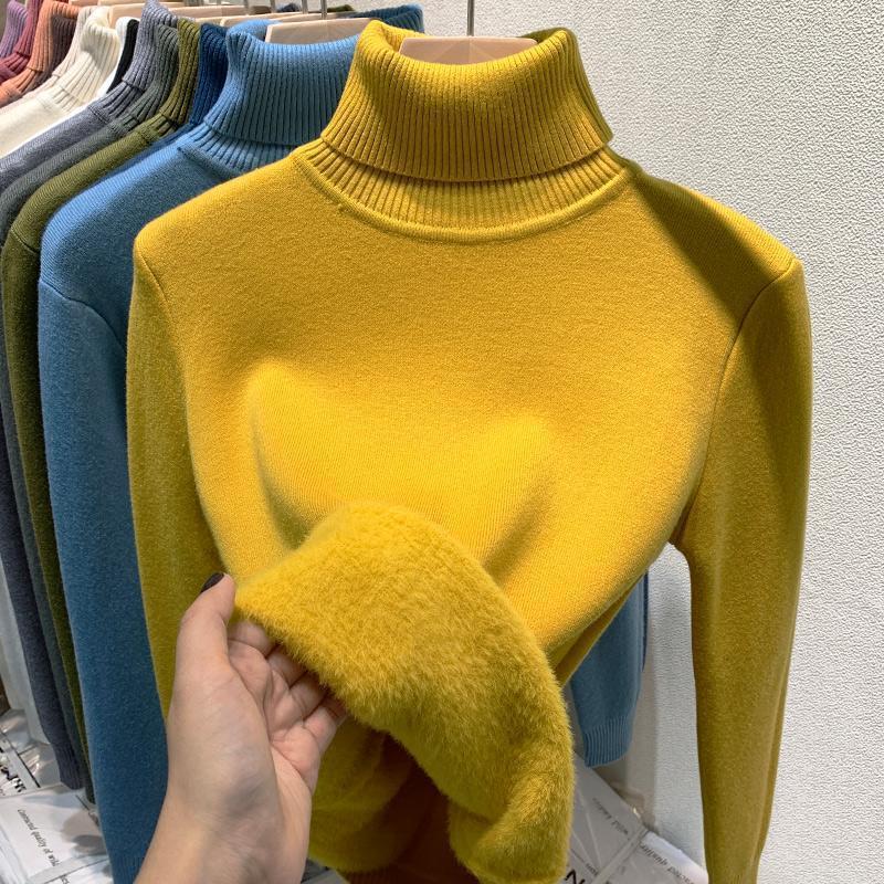 Women's knitted sweater with turtleneck, form-fitting