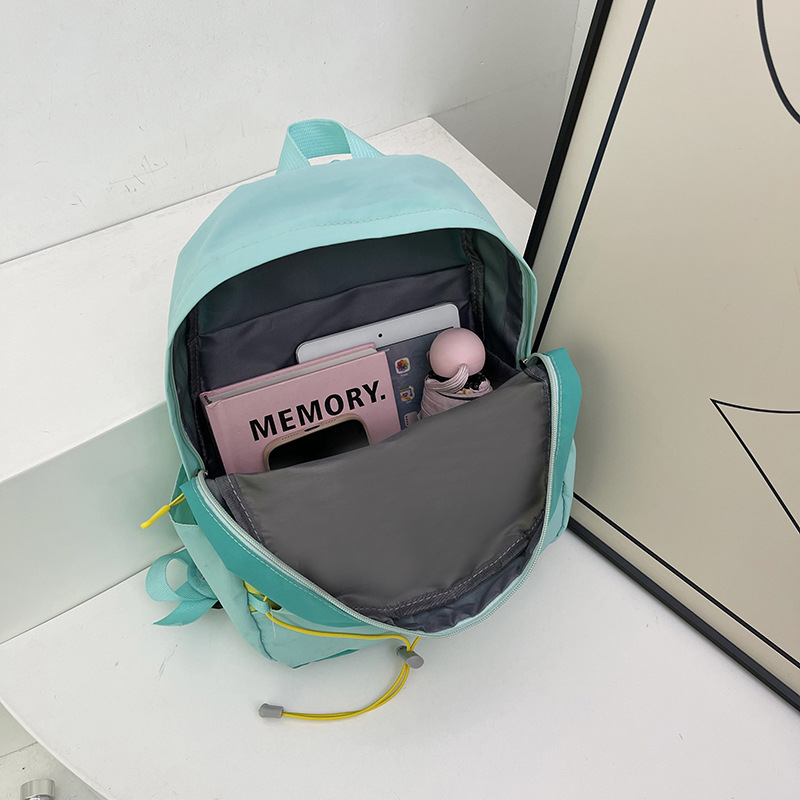Nylon backpack, 20–35 L, with letter pattern