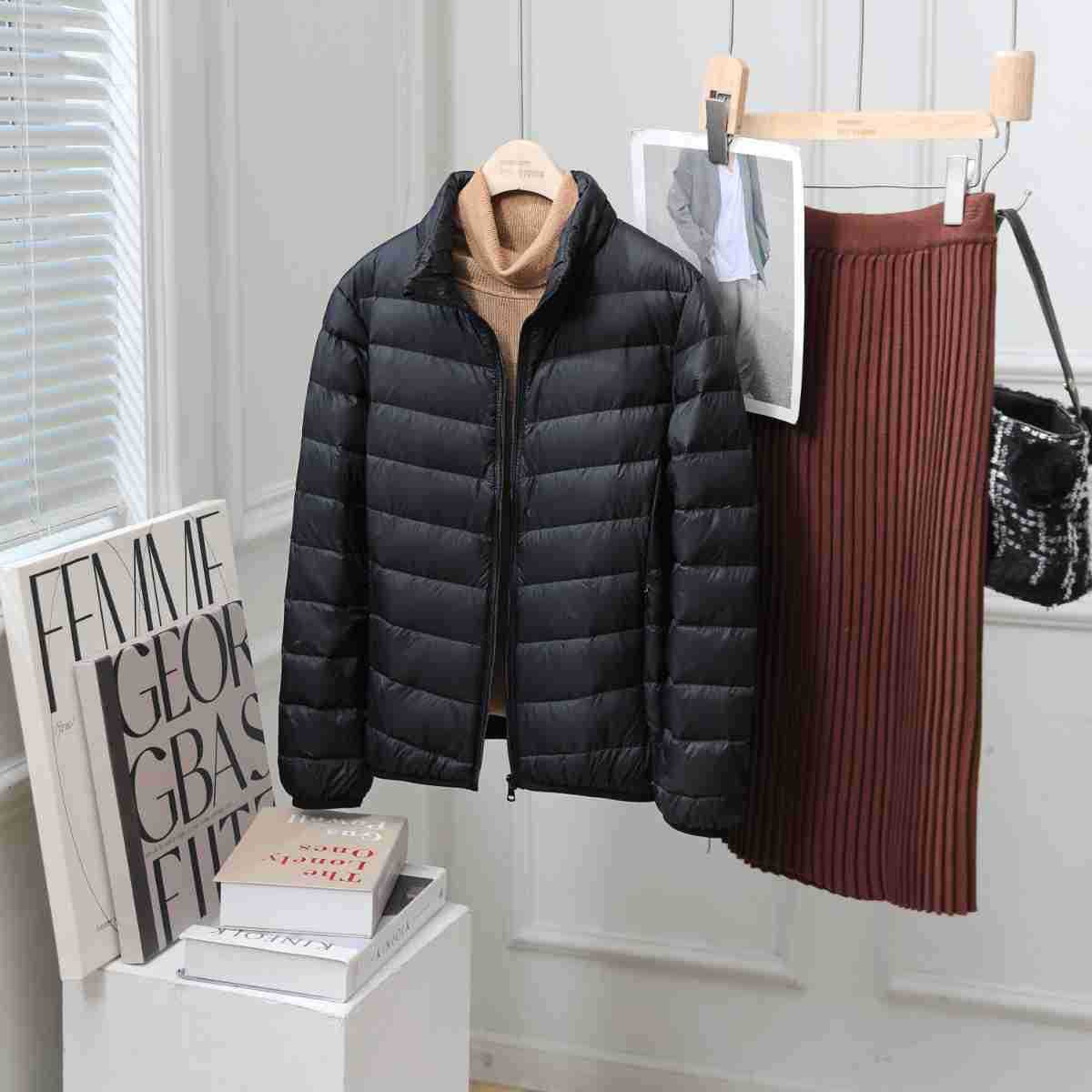 Lightweight women's down jacket with standing collar, white duck down