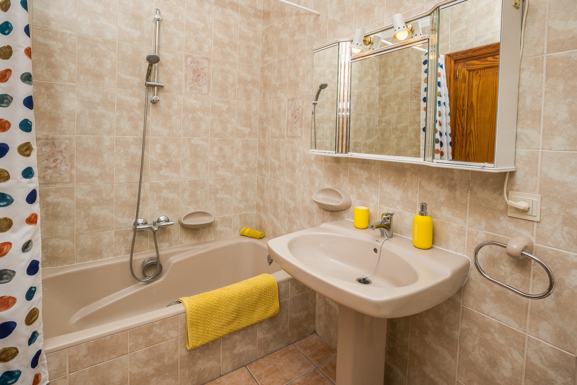 Bathroom with bathtub and natural light