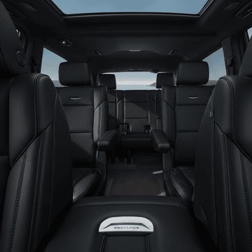 Black leather passenger seats inside a Cadillac Escalade ESV