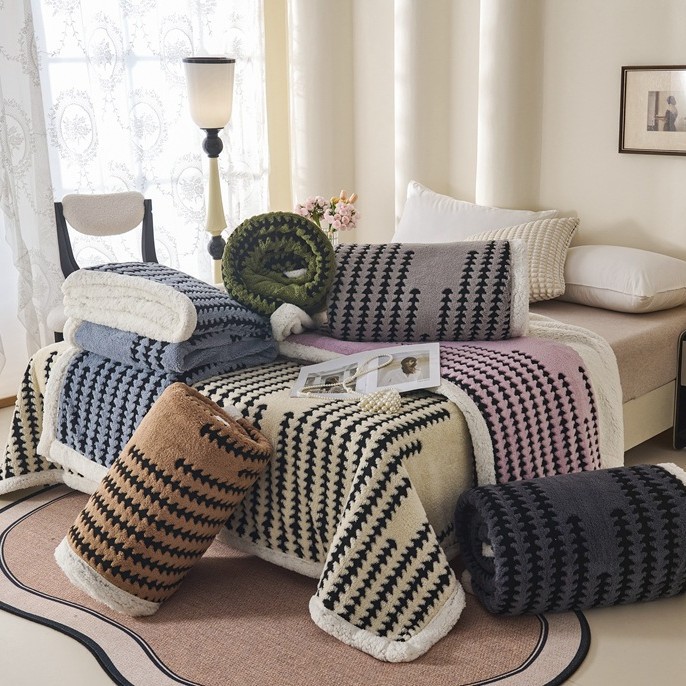 Double-layered living blanket with lamb fleece look