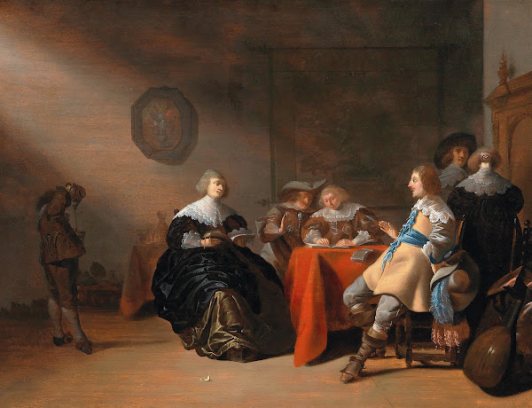 An interior with a company conversing at a table