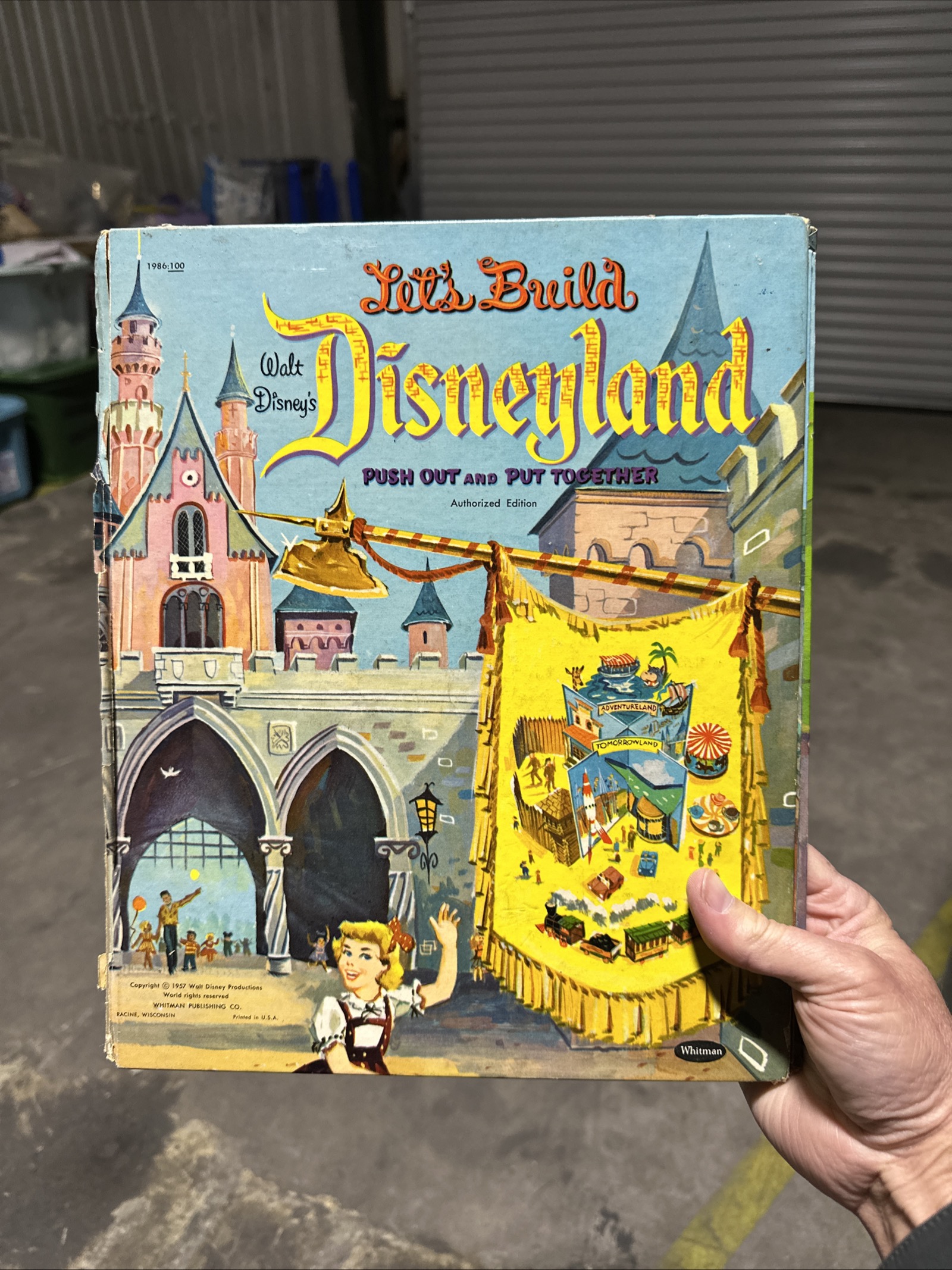 1957 Whitman Publishing "Let's Build Disneyland" push-out paper model activity book, large format, showing Disneyland attraction artwork on cover