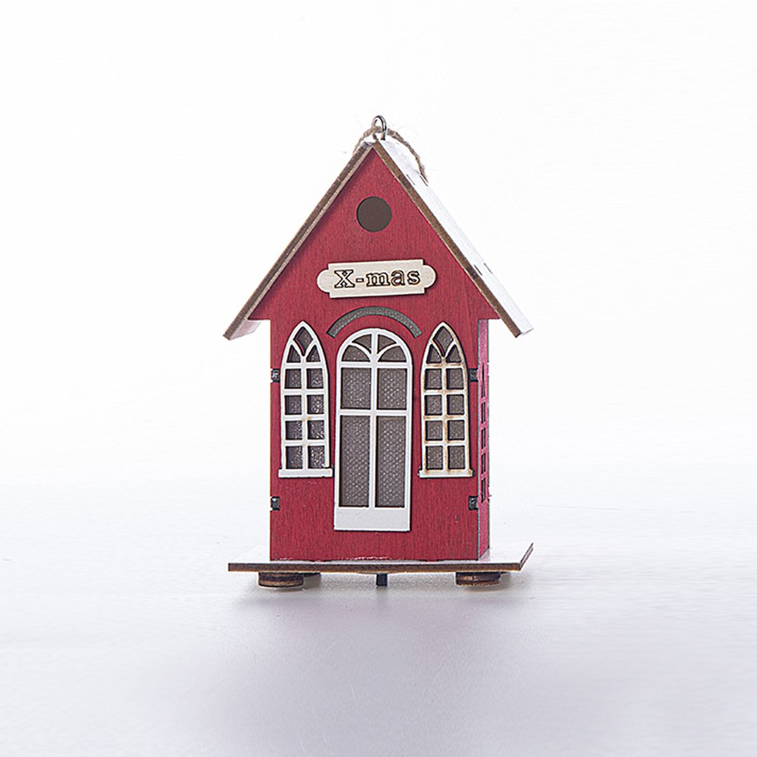 Illuminated wooden house for Christmas decoration