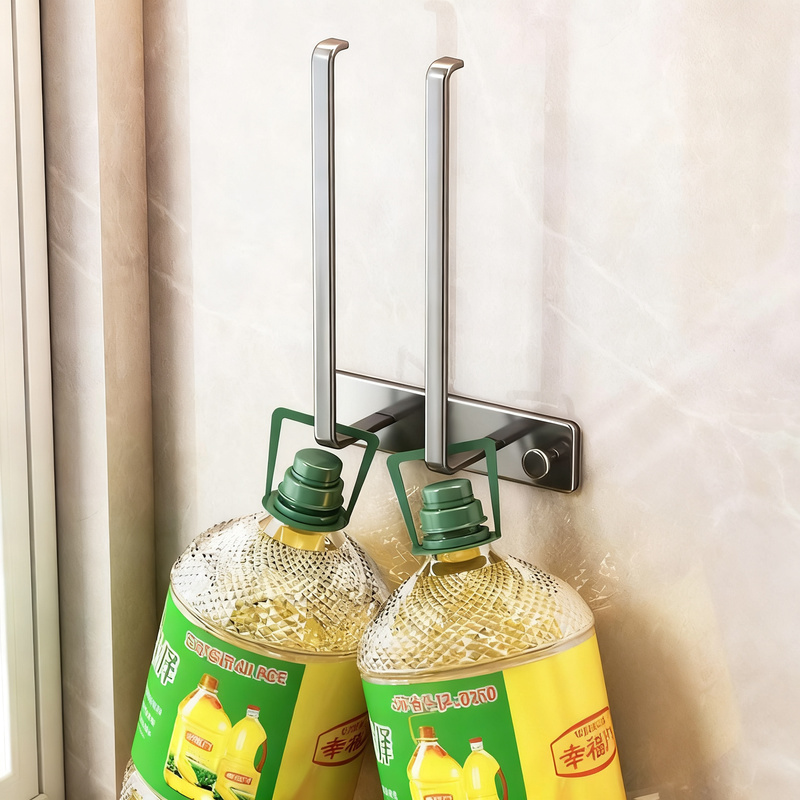 Kitchen wall holder for rolls and cloths, metal