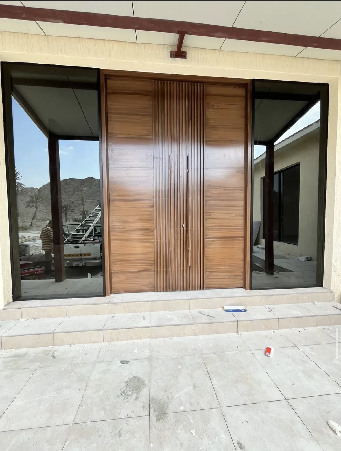Black steel villa entrance gate UAE — Al Taher Group