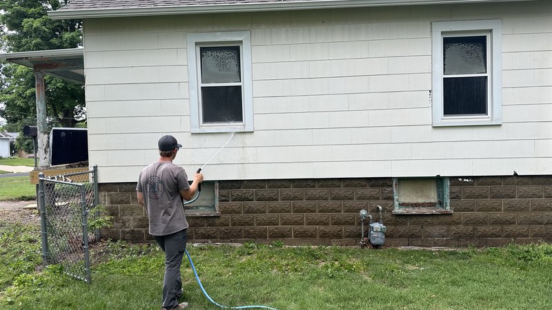 House exterior being washed and prepped before painting in Woodford County IL