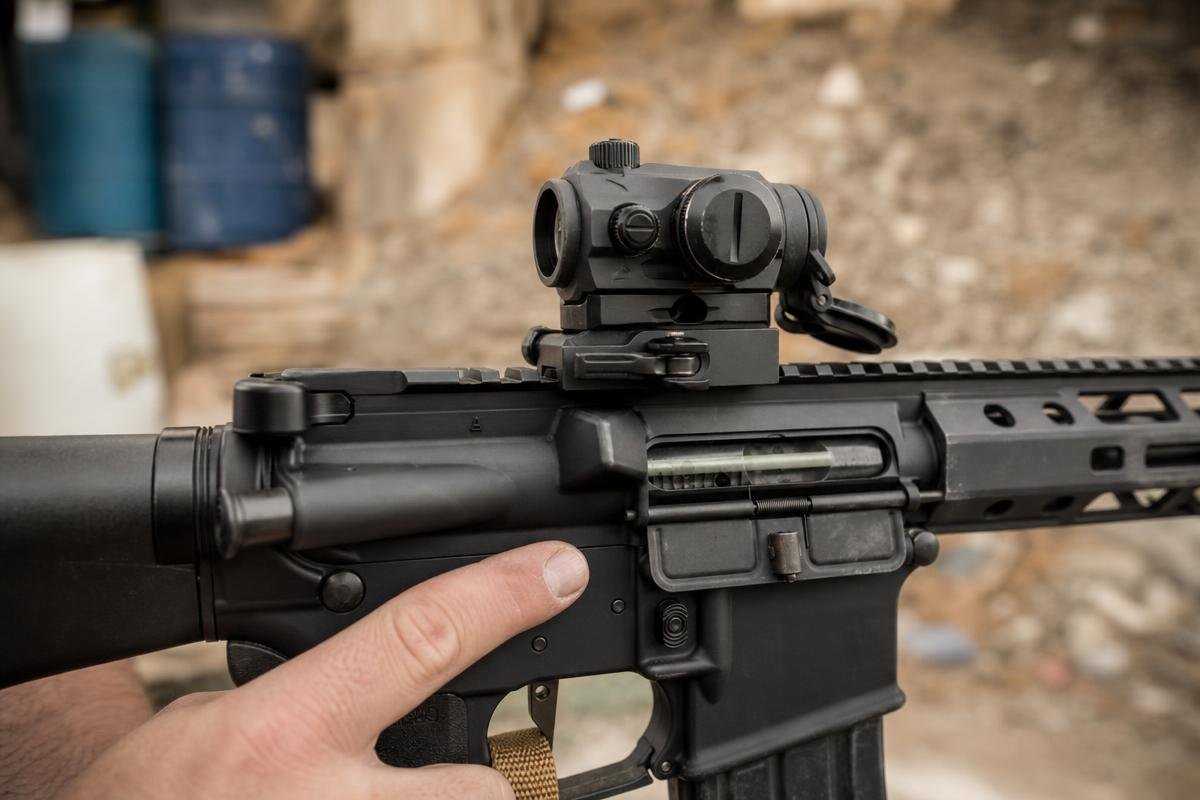 suppressed AR-15 charging handle gas deflection at rear of upper