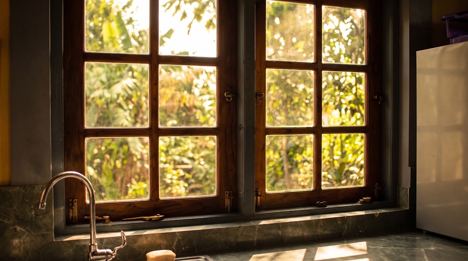 Sunlight Streaming Through Wooden Kitchen Finishes