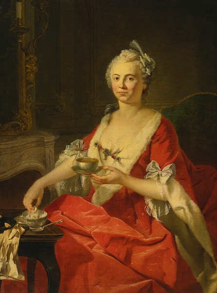 Portrait of a woman taking tea