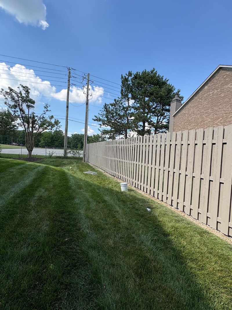 Yardley Court perimeter fence with fresh solid stain