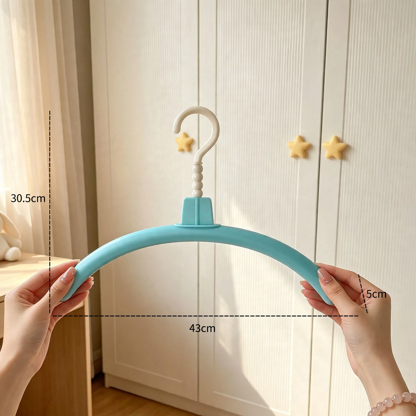 Plastic hanger with non-slip surface