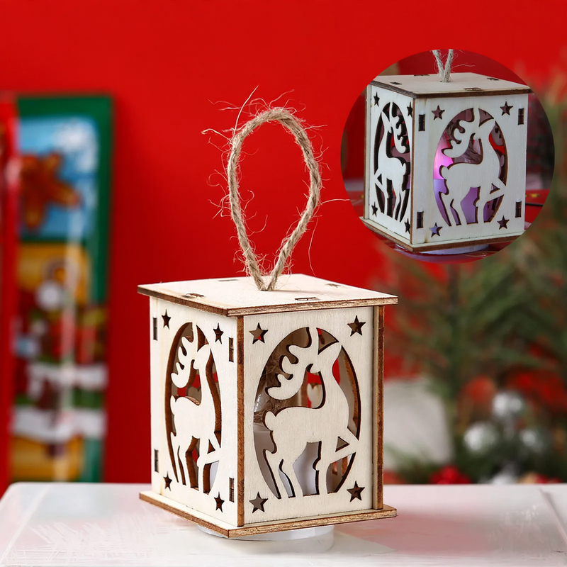Illuminated wooden house as Christmas decoration