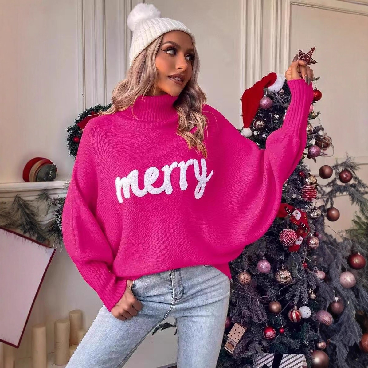 Women's knitted sweater with stand-up collar and embroidery
