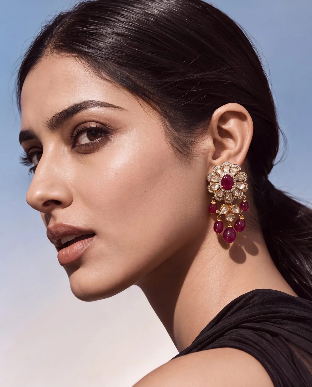 Model in profile wearing the Shalaka Polki and Diamond Long Earrings from Tyaani