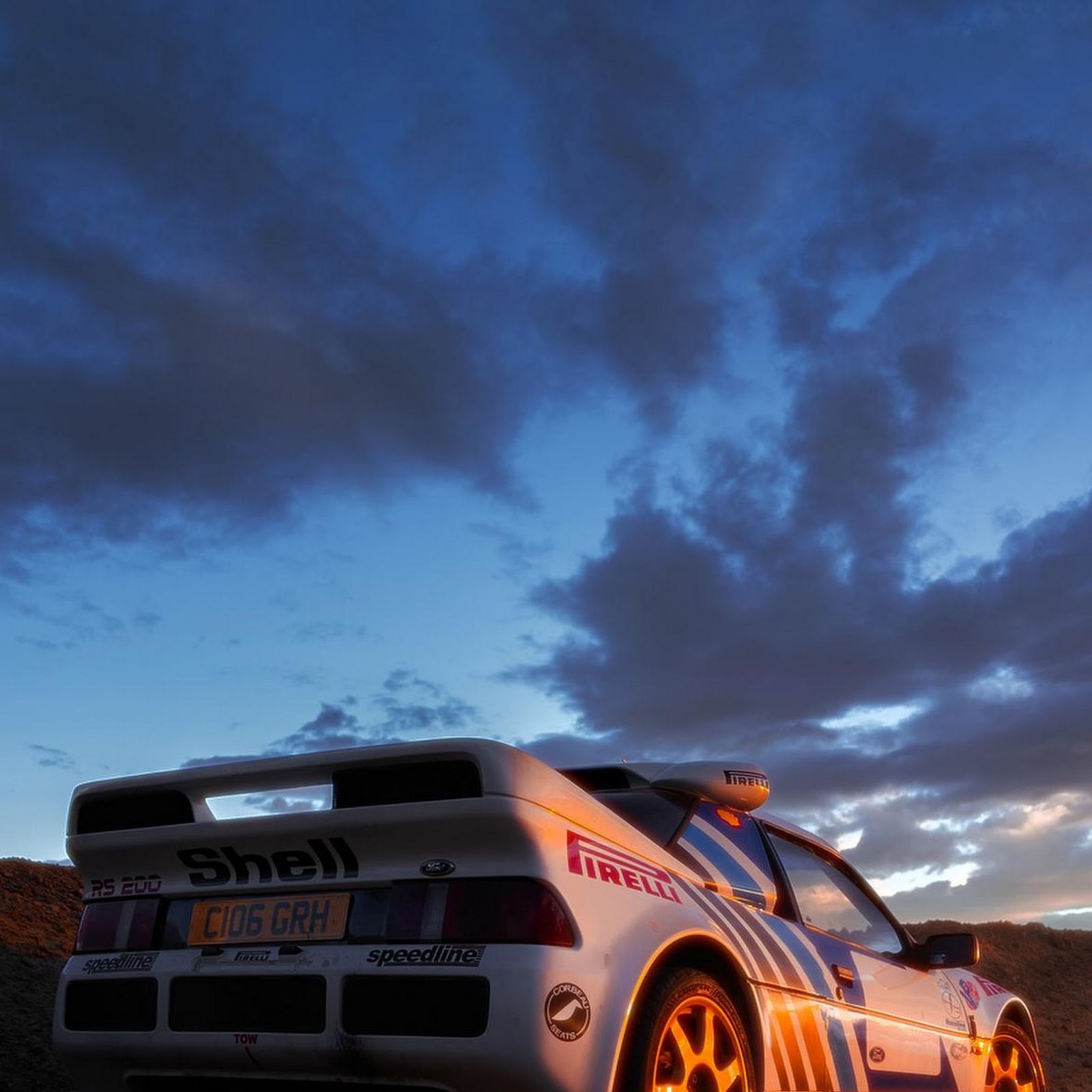 Download Ford RS200 Rally Car At Sunset Full HD iPhone