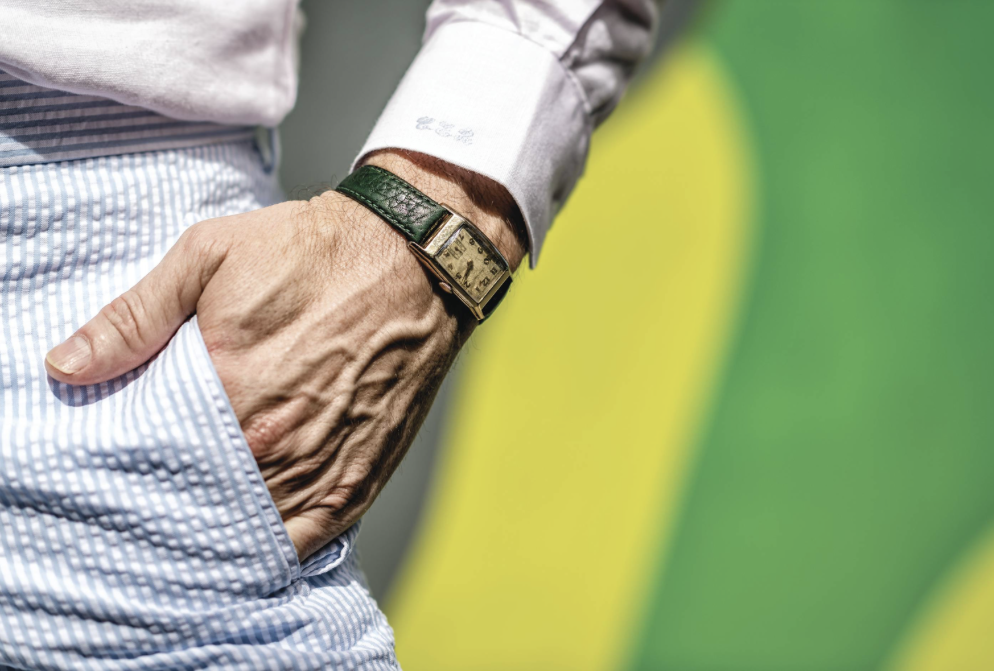 Tailored menswear laid out for a Miami yacht event, featuring linen and lightweight fabrics