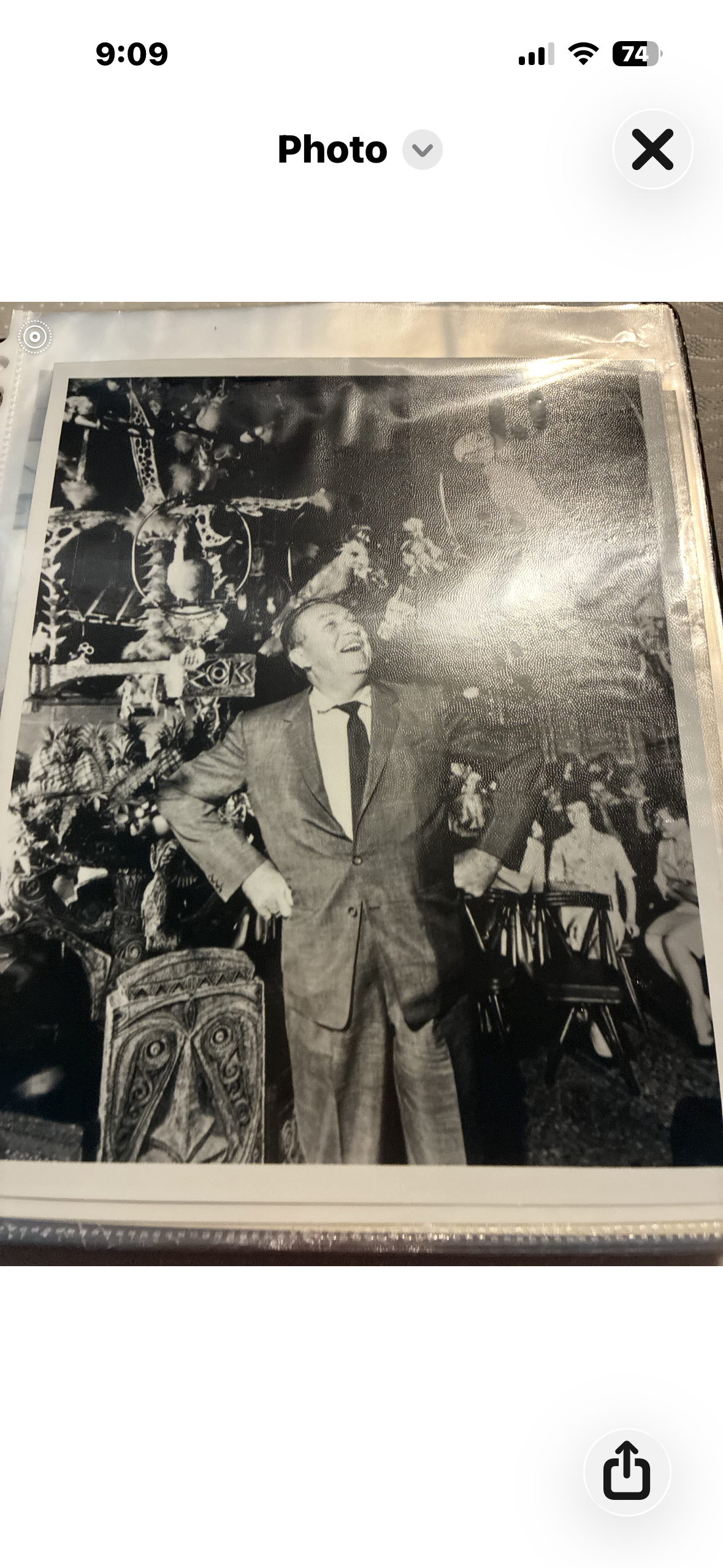 Black and white 8x10 press photograph of Walt Disney inside the Enchanted Tiki Room at Disneyland with Audio-Animatronic birds Jose and the Barker Bird, circa 1963